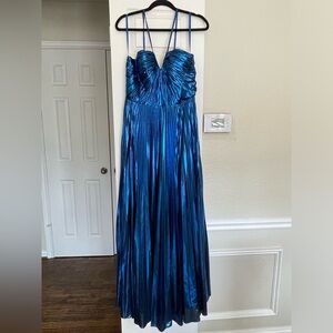 GB prom dress size 13. Iridescent blue.  Unaltered.  Currently at Dillards.